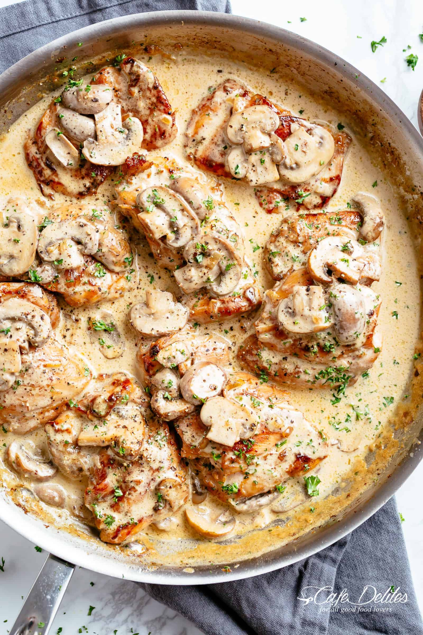 Chicken Thighs With Creamy Mushroom Garlic Sauce - Cafe Delites Chicken Thighs With Creamy Mushroom Garlic Sauce - Cafe Delites