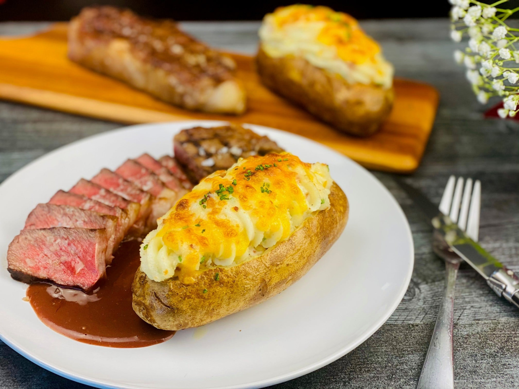 Loaded Twice Baked Potato with Grilled New York Strip Steak Recipe